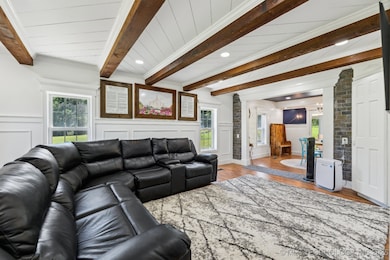 Bright and inviting, the living room is filled wit