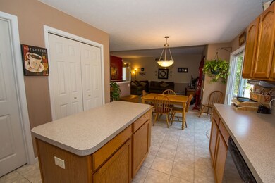 View of kitchen looking into Living Room.