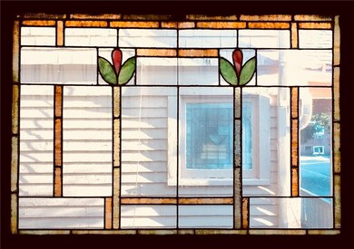 One of three stained glass windows in this home wi