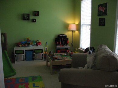 Dining room used as a colorful Play room.