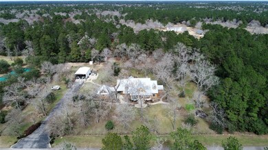 Aerial view of the home and property