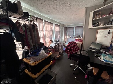 Office featuring a textured ceiling