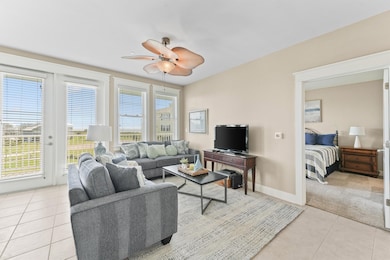 Large windows line the walls, providing stunning v