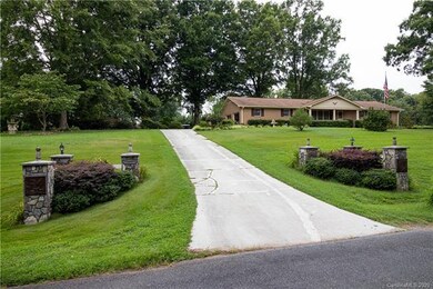 Custom driveway entrance, 2 car garage, side load