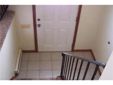 Foyer Nice, neutral ceramic tile floor in entry