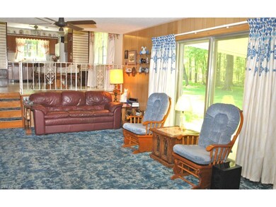 The comfortable family room overlooks the beautifu