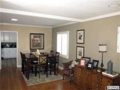 Formal dining room adjacent to living room offers 