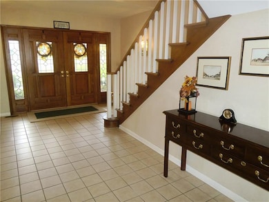 Double entry doors with lead-glass side lights wel