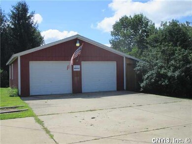 Exterior Front. The garage is extra large...has gr