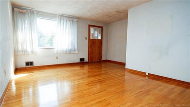 Original, pristine hardwood floors, trim and doors
