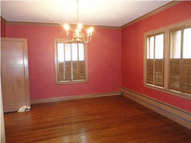 Formal Dining Room with Shuttered Window Treatment