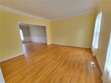 Formal Living Room with crown molding