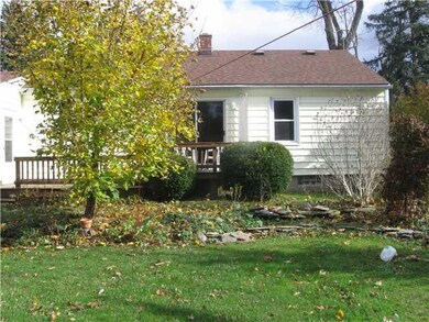 Exterior Back. nice deck to enjoy the sun.
