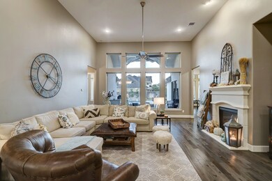What a glorious view! This spectacular wall of windows bathes this interior space with warm sunlight and dark starry skies! Don't be afraid that your pieces won't fit! You've got plenty of relaxing room!