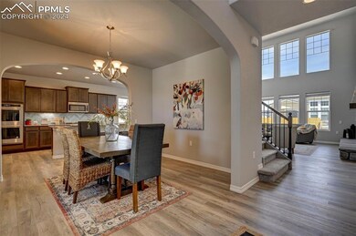 Dining space featuring light hardwood / wood-style