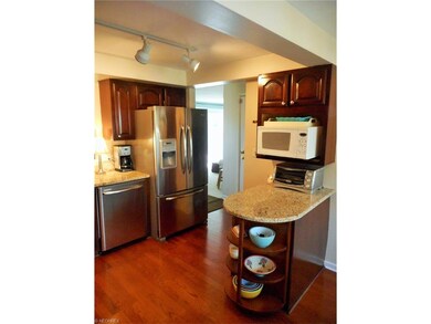The beautiful wood floored kitchen with studio lig