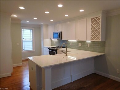 Super Bright Kitchen. New Cabinets, marble counters, tile backsplash, SS built-in MW, DW & freestanding gas range/oven. Eat at Peninsula, Pantry space & Farm Sink.
