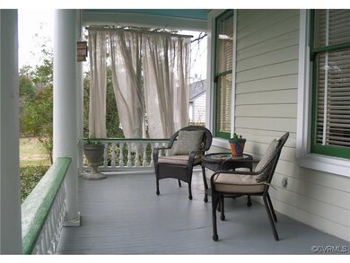 The full front porch is approximately 25' by 8'