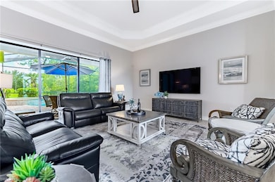 Living room with view of pool area