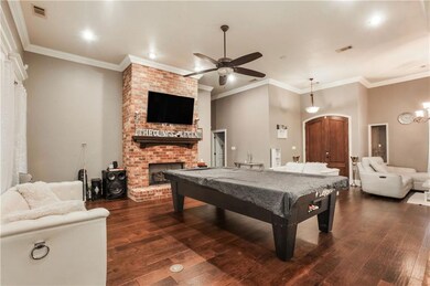 Great room, spacious with hardwood floors overlook