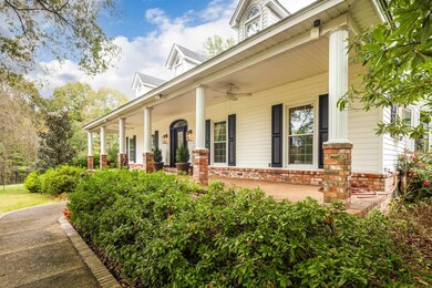 Doorway to property featuring a porch