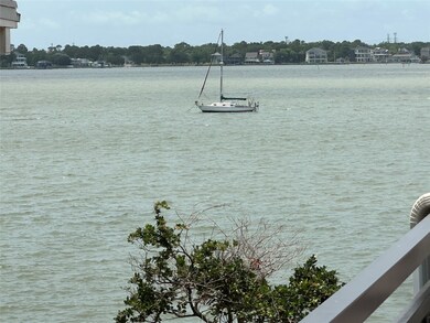 Peekaboo view of lake from living room and first F