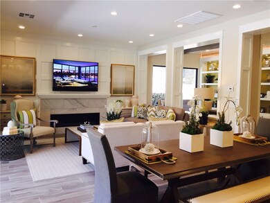 Photo is of the Delamar Model great room and is fo