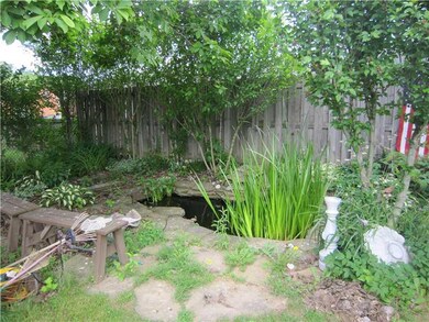Yard/Garden. Koi Pond with tons of Perennials