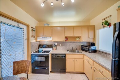 Nicely organized kitchen. Under the base cabinet o