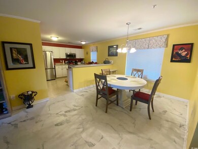 Dining room featuring an inviting chandelier and o