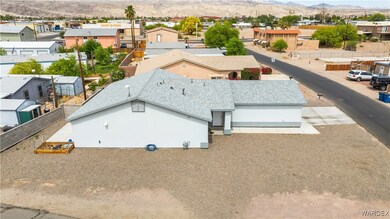 Drone / aerial view with a mountain view and a res