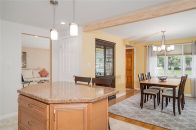 Kitchen opens to lovely dining room.