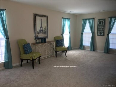 Living Room is extra large with lots of natural li