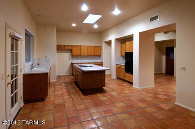 BREAKFAST AREA LOOKING TO KITCHEN