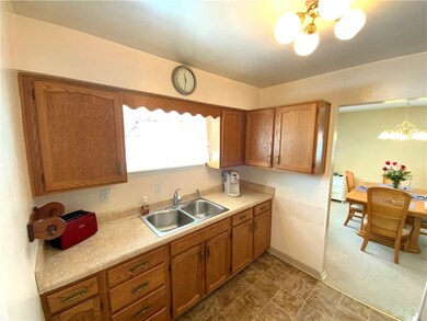Solid wood cabinets in galley kitchen. You could e