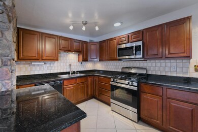 Kitchen with granite counters