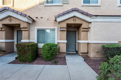 Entrance to property featuring stucco siding