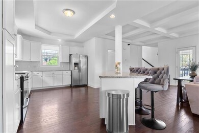 Kitchen with appliances with stainless steel finis