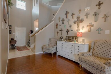 Soaring ceiling allows natural light to fill the h