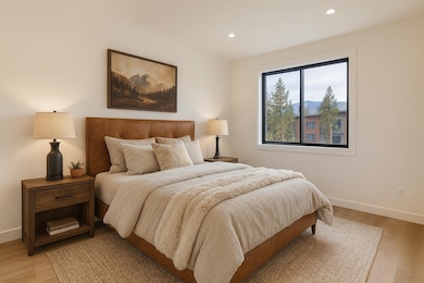 Bedroom featuring light wood-style flooring and recessed lighting