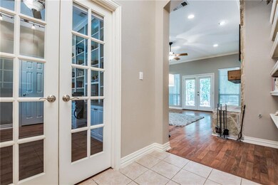 Home #1 entrance with french doors that lead into 