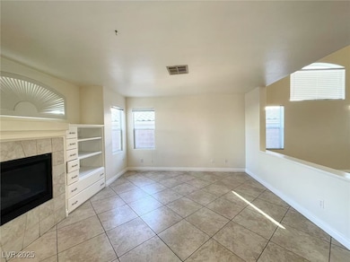 Unfurnished living room with light tile patterned