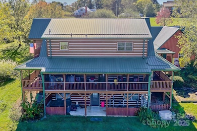 Set into rolling hillside pastureland, this rustic-modern cabin offers room to live, play, and entertain! 