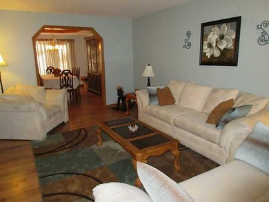 Living Room. View from living room into dining roo
