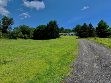 Home at bottom of driveway