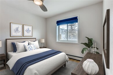 Bedroom - shown virtually staged. Unit is unfurnis