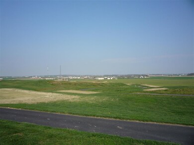 view of the 18th hole tee box and surrounding coun
