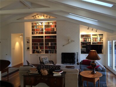 GREAT RM WITH FL TO CEILING BRICK FIREPLACE FLANKE