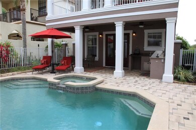 Fenced courtyard pool/outdoor kitchen