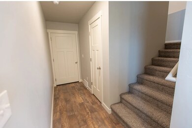 hallway from living room to garage/upstairs